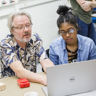 Professor helping student