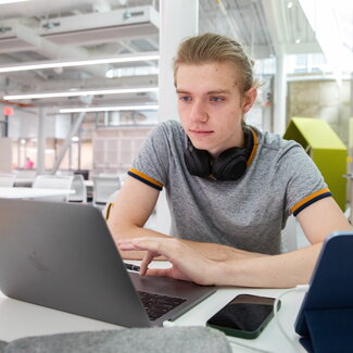 Student working on laptop