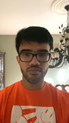Dhruv Kaul smiling at the camera