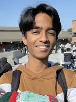 Dhanish Natarajan Smiling at the camera
